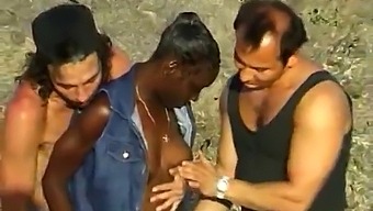 Black Woman Enjoys A Threesome With Two White Men By The Seaside
